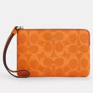 Coach Corner Zip Wristlet Signature Coated Canvas in Gold/Bright Mandarin, NWT